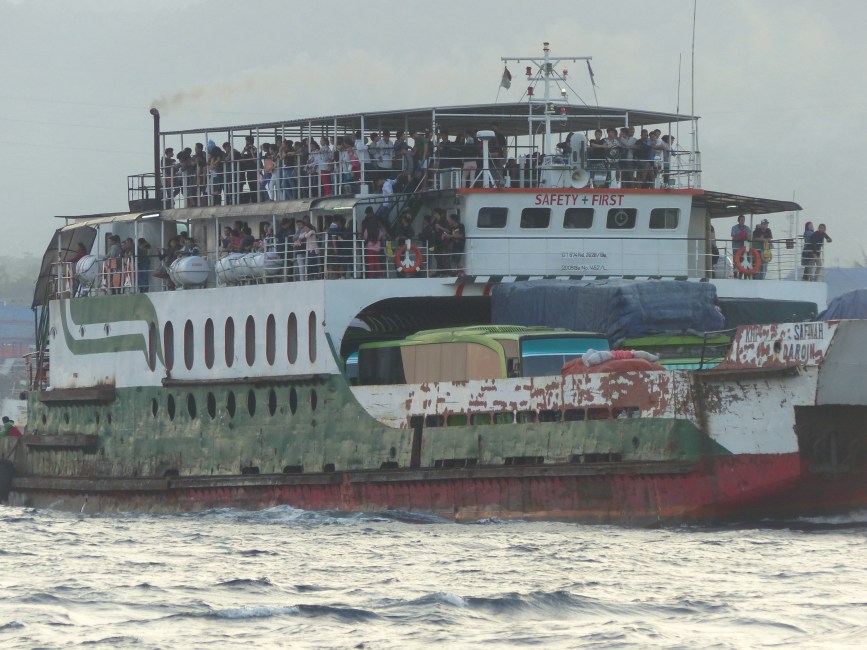 One of the older ferries waiting in line to dock.